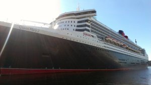 The Queen Mary 2, standing proud at Pier 88 in New York on a sun-kissed September morning. 