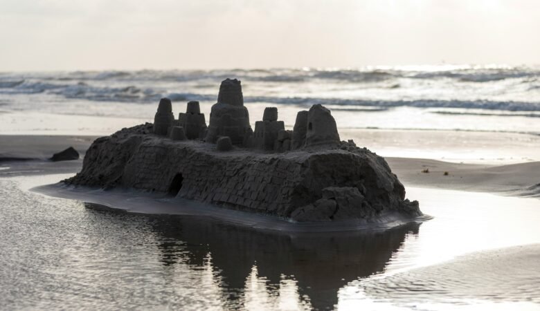 Until June comes again, sandcastles like the one shown will disappear with the waves.